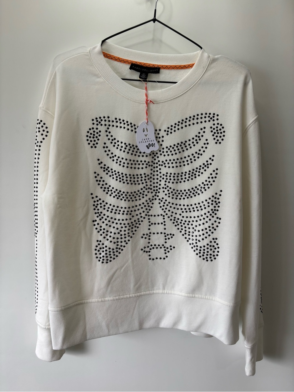 Jane and Delancey Cream Crewneck Sweatshirt with Black Studded Ribcage Graphic